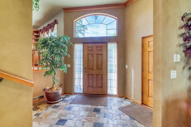 21005 County Highway 32, Rochert, MN 56578 - entryway with stone tile flooring, baseboards, and a towering ceiling
