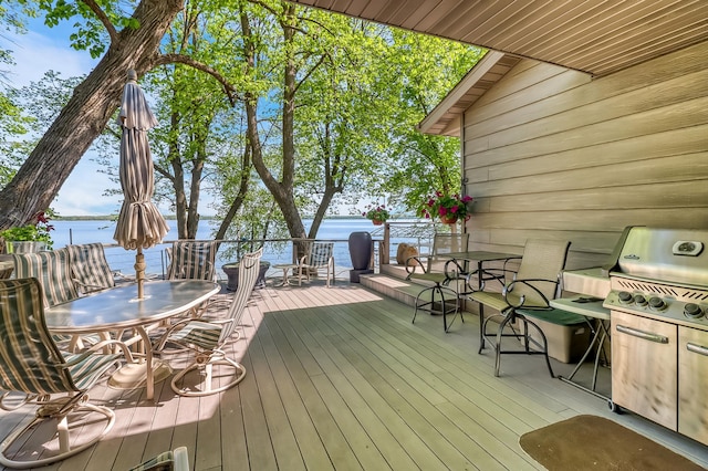 21005 County Highway 32, Rochert, MN 56578 - wooden terrace featuring a water view and outdoor dining area