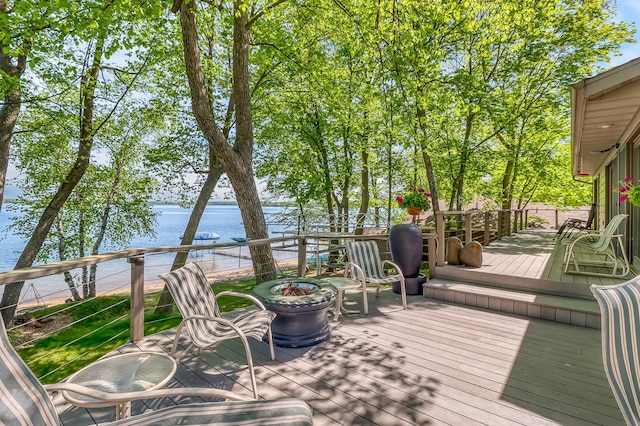 21005 County Highway 32, Rochert, MN 56578 - deck featuring a water view and an outdoor fire pit