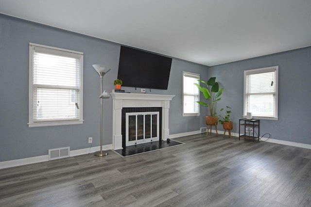 75 Geranium Ave E, Saint Paul, MN 55117 - living room featuring a fireplace with flush hearth and wood finished floors