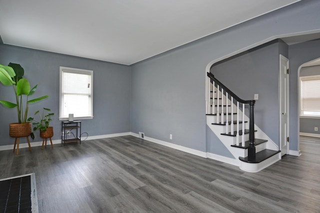75 Geranium Ave E, Saint Paul, MN 55117 - spare room with plenty of natural light, wood finished floors, and stairway