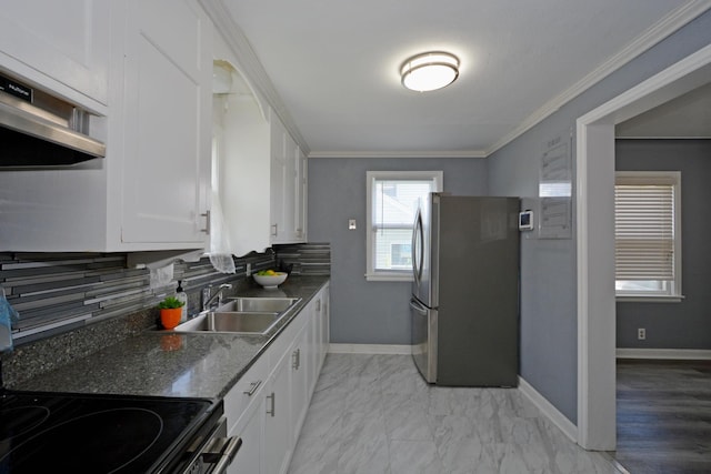 75 Geranium Ave E, Saint Paul, MN 55117 - kitchen featuring freestanding refrigerator, white cabinets, backsplash, range with electric stovetop, and exhaust hood