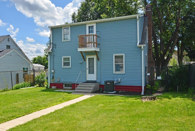 75 Geranium Ave E, Saint Paul, MN 55117 - back of house with entry steps, a balcony, and a chimney