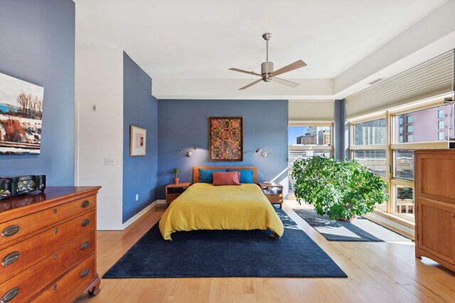 490 Temperance St Unit 403, Saint Paul, MN 55101 - bedroom with a ceiling fan and wood finished floors