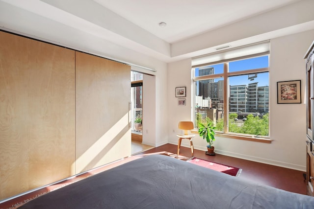 490 Temperance St Unit 403, Saint Paul, MN 55101 - bedroom featuring a view of city, baseboards, and visible vents