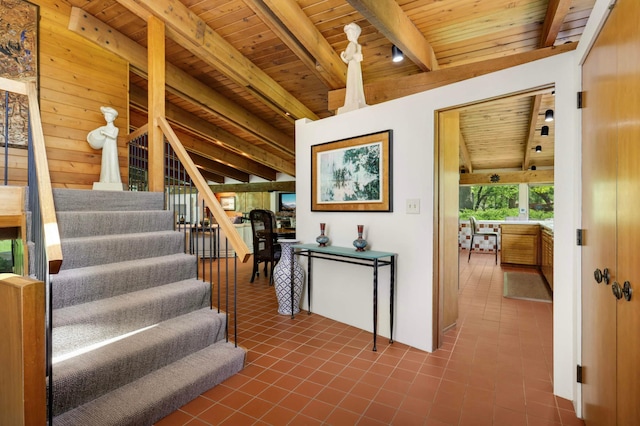 4618 Cedarwood Rd, Saint Louis Park, MN 55416 - stairs featuring wooden ceiling with exposed beams and tile patterned floors