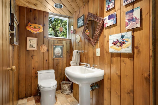 4618 Cedarwood Rd, Saint Louis Park, MN 55416 - bathroom with wood walls and toilet