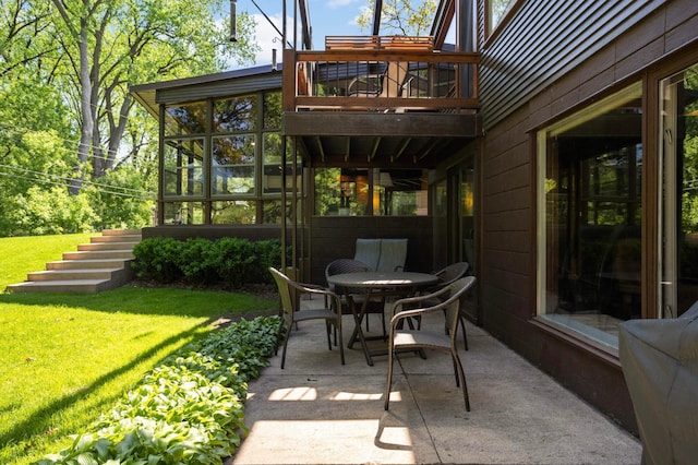 4618 Cedarwood Rd, Saint Louis Park, MN 55416 - view of patio / terrace with stairway, a balcony, outdoor dining area, and a sunroom