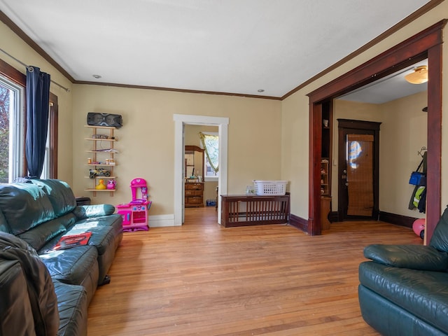 3213 Minnehaha Ave, Minneapolis, MN 55406 - living area with light wood-style flooring, ornamental molding, and baseboards