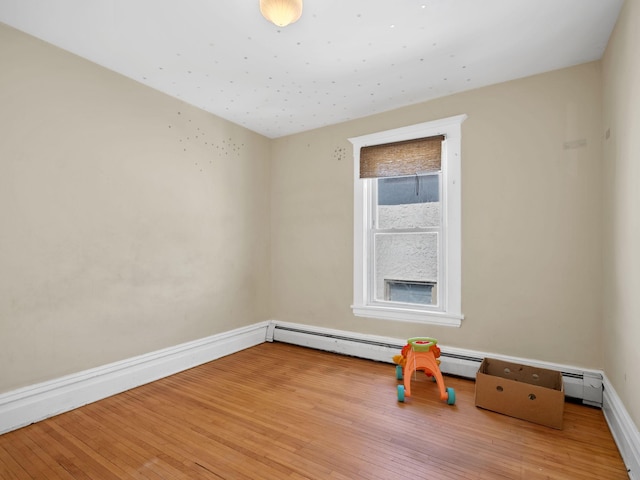 3213 Minnehaha Ave, Minneapolis, MN 55406 - empty room featuring wood-type flooring and baseboards