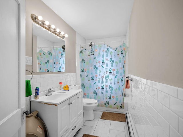 3213 Minnehaha Ave, Minneapolis, MN 55406 - full bath featuring tile walls, a baseboard radiator, shower / bath combo, toilet, and vanity
