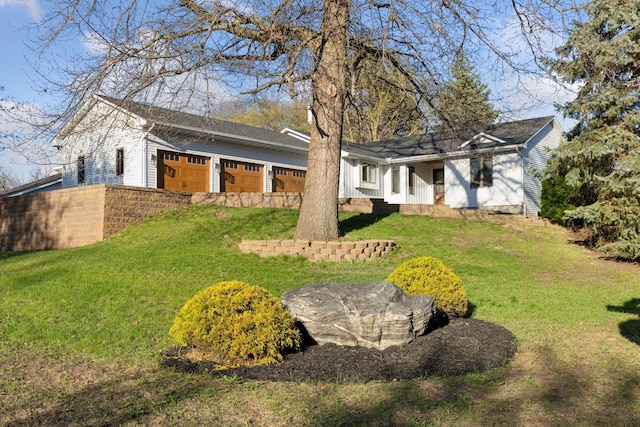 view of yard with a garage