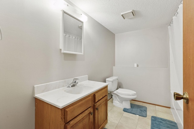 full bath with vanity, toilet, a textured ceiling, tile patterned floors, and curtained shower
