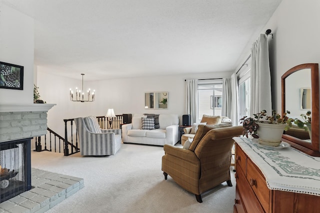 living room featuring a fireplace, a chandelier, and light colored carpet