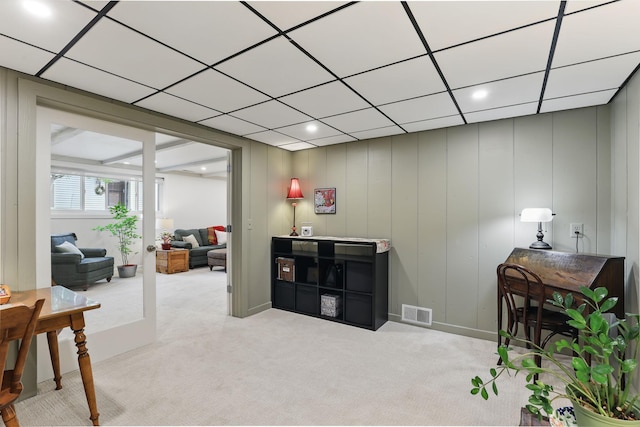 sitting room featuring visible vents and carpet
