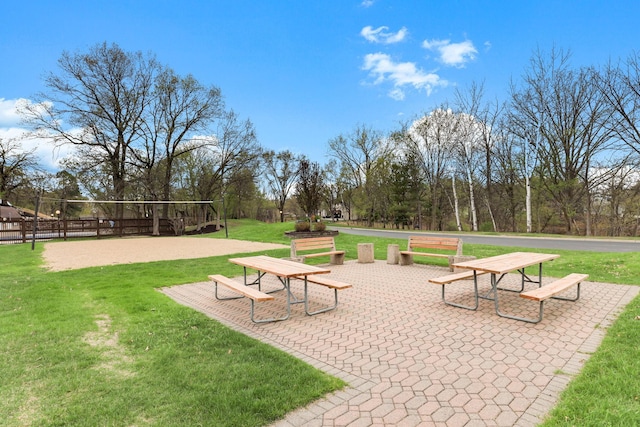 view of property's community featuring volleyball court and a yard