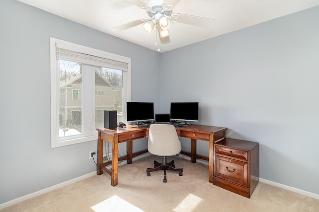home office with baseboards, carpet, and ceiling fan