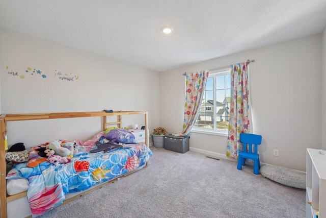 18357 Glacier Way, Lakeville, MN 55044 - carpeted bedroom with baseboards and visible vents