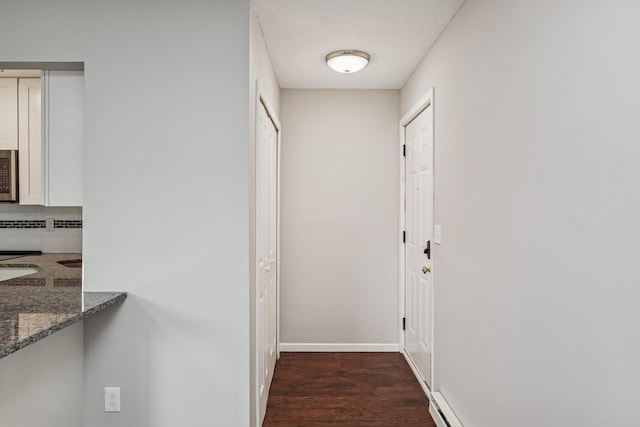2110 Ridge Dr Unit 11, Saint Louis Park, MN 55416 - hallway with dark wood finished floors and baseboards