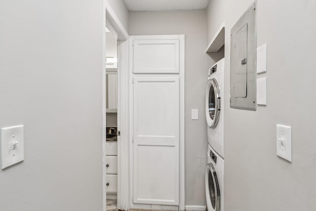 2110 Ridge Dr Unit 11, Saint Louis Park, MN 55416 - laundry area with estacked washer and dryer and electric panel