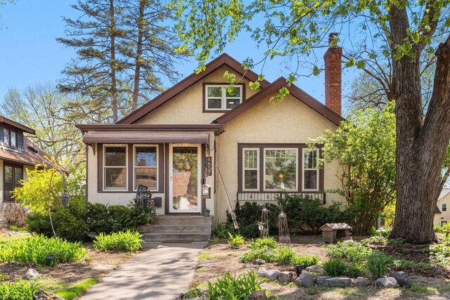 view of front of property with stucco siding and entry steps