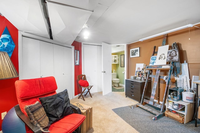 sitting room featuring carpet