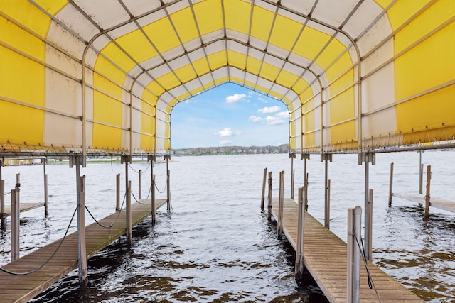 view of dock with a water view