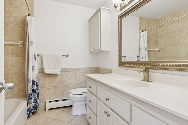 full bath with vanity, toilet, tile patterned floors, tile walls, and a baseboard heating unit