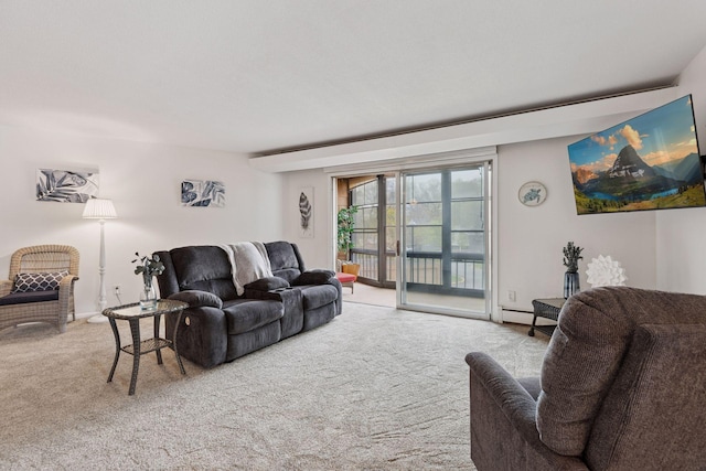 living area featuring carpet floors and a baseboard radiator