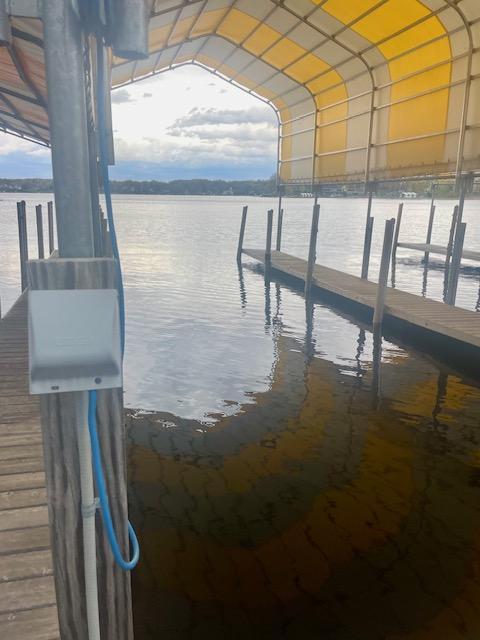 view of dock with a water view
