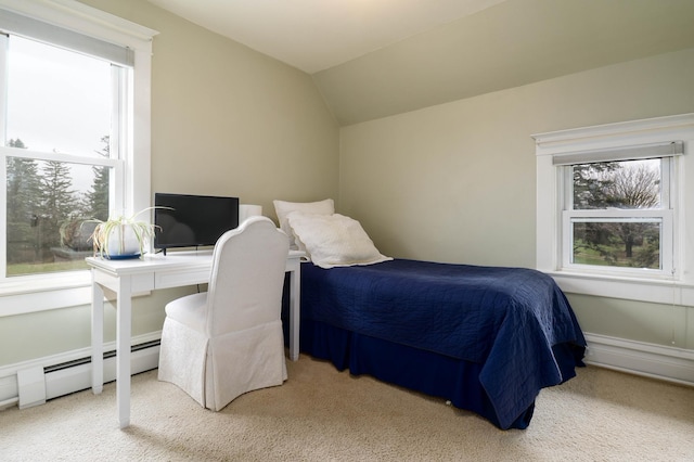 carpeted bedroom featuring baseboard heating and lofted ceiling