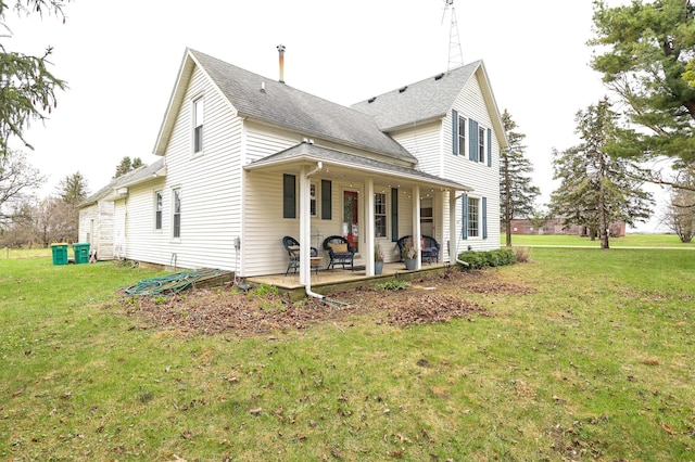 view of property exterior featuring a yard, roof with shingles, and a patio area