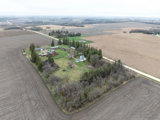 birds eye view of property featuring a rural view