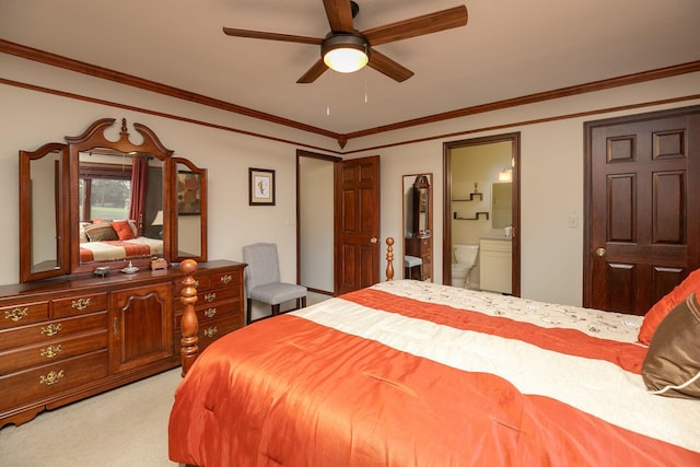 bedroom with ensuite bathroom, light carpet, ornamental molding, and ceiling fan