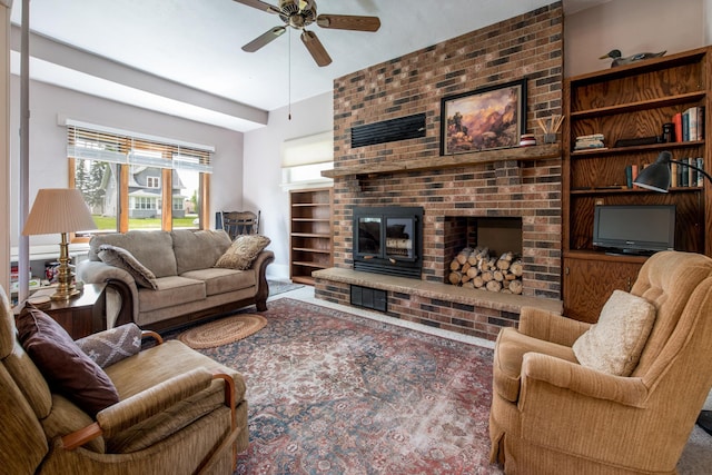 106 4th St, Cyrus, MN 56323 - living area featuring a ceiling fan and a fireplace