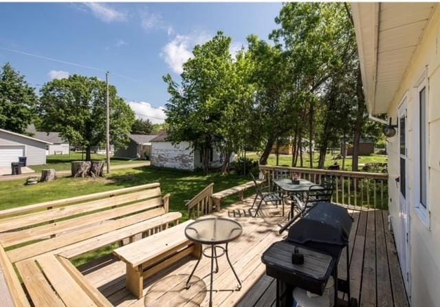 106 4th St, Cyrus, MN 56323 - wooden terrace featuring a yard and outdoor dining space