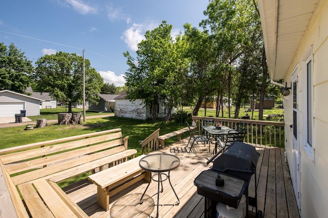 106 4th St, Cyrus, MN 56323 - wooden deck with a yard and outdoor dining area