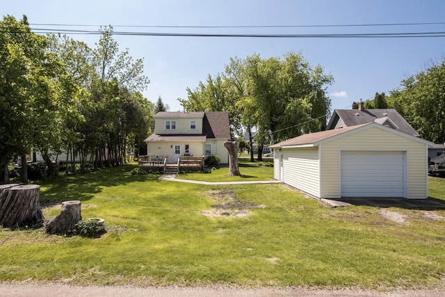 106 4th St, Cyrus, MN 56323 - view of yard with an outbuilding, driveway, a wooden deck, and a detached garage