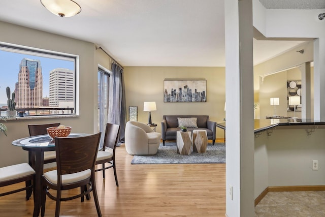 interior space featuring baseboards and wood finished floors