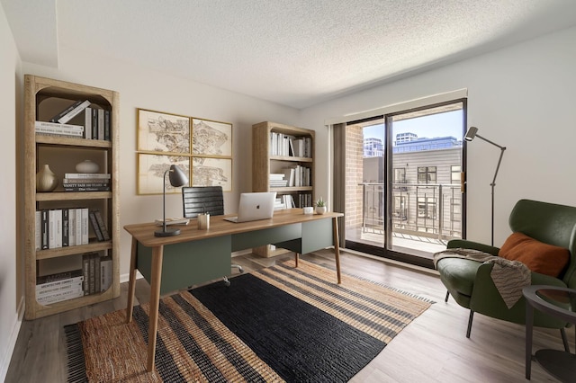 401 1st St Unit 414, Minneapolis, MN 55401 - office with wood finished floors and a textured ceiling