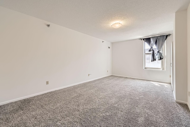 401 1st St Unit 414, Minneapolis, MN 55401 - carpeted spare room with a textured ceiling and baseboards