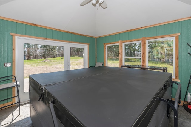 dining area featuring ceiling fan, vaulted ceiling, and a healthy amount of sunlight
