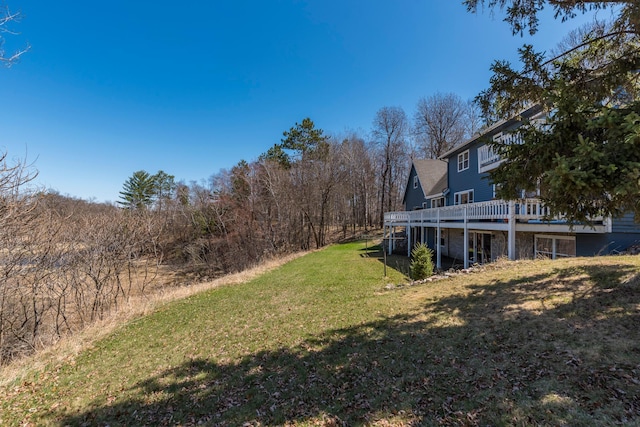 view of yard featuring a wooden deck