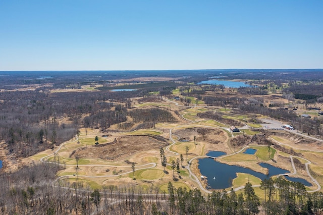 aerial view featuring a water view and golf course view