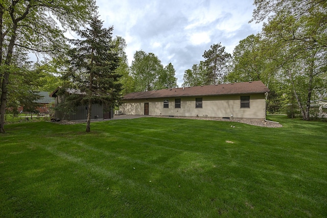 37138 Blacksmith Pl, Crosslake, MN 56442 - back of property with a yard and an outdoor structure