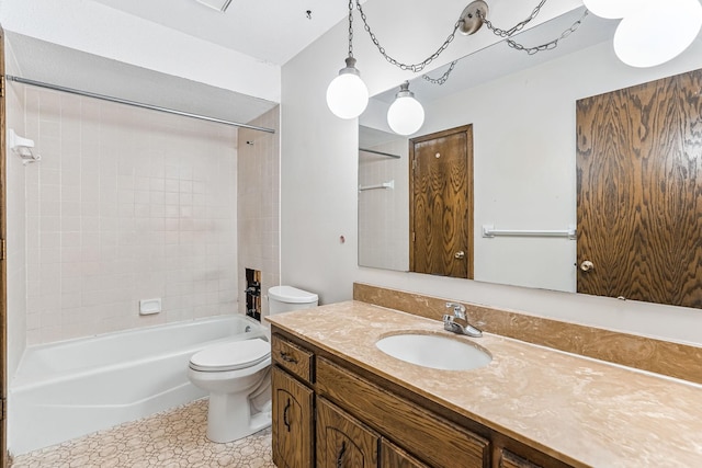 full bathroom featuring shower / bath combination, vanity, and toilet