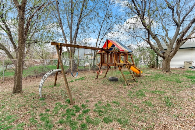view of jungle gym with fence
