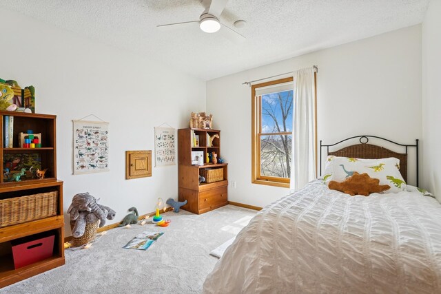 3412 Williamsburg Pkwy, Woodbury, MN 55129 - carpeted bedroom featuring baseboards, a ceiling fan, and a textured ceiling