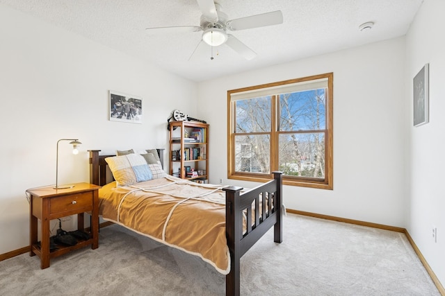 3412 Williamsburg Pkwy, Woodbury, MN 55129 - bedroom with baseboards, light colored carpet, and ceiling fan