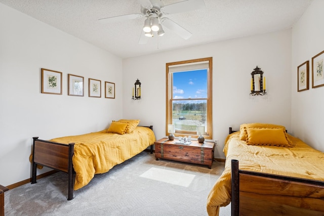 3412 Williamsburg Pkwy, Woodbury, MN 55129 - bedroom with carpet flooring, ceiling fan, and baseboards